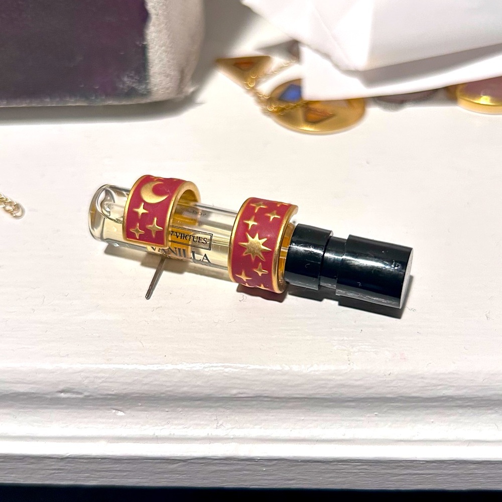 “Nights sky huggie hoop earrings”